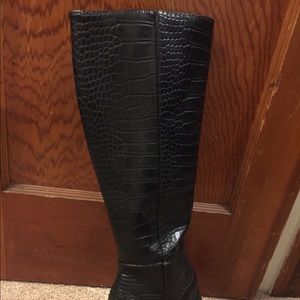 High heeled black boots